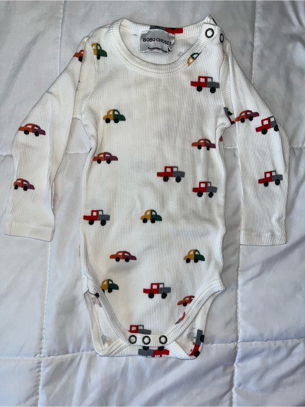 Bobo Choses White Ribbed Long-Sleeve One-Piece with Multicolor Car Print